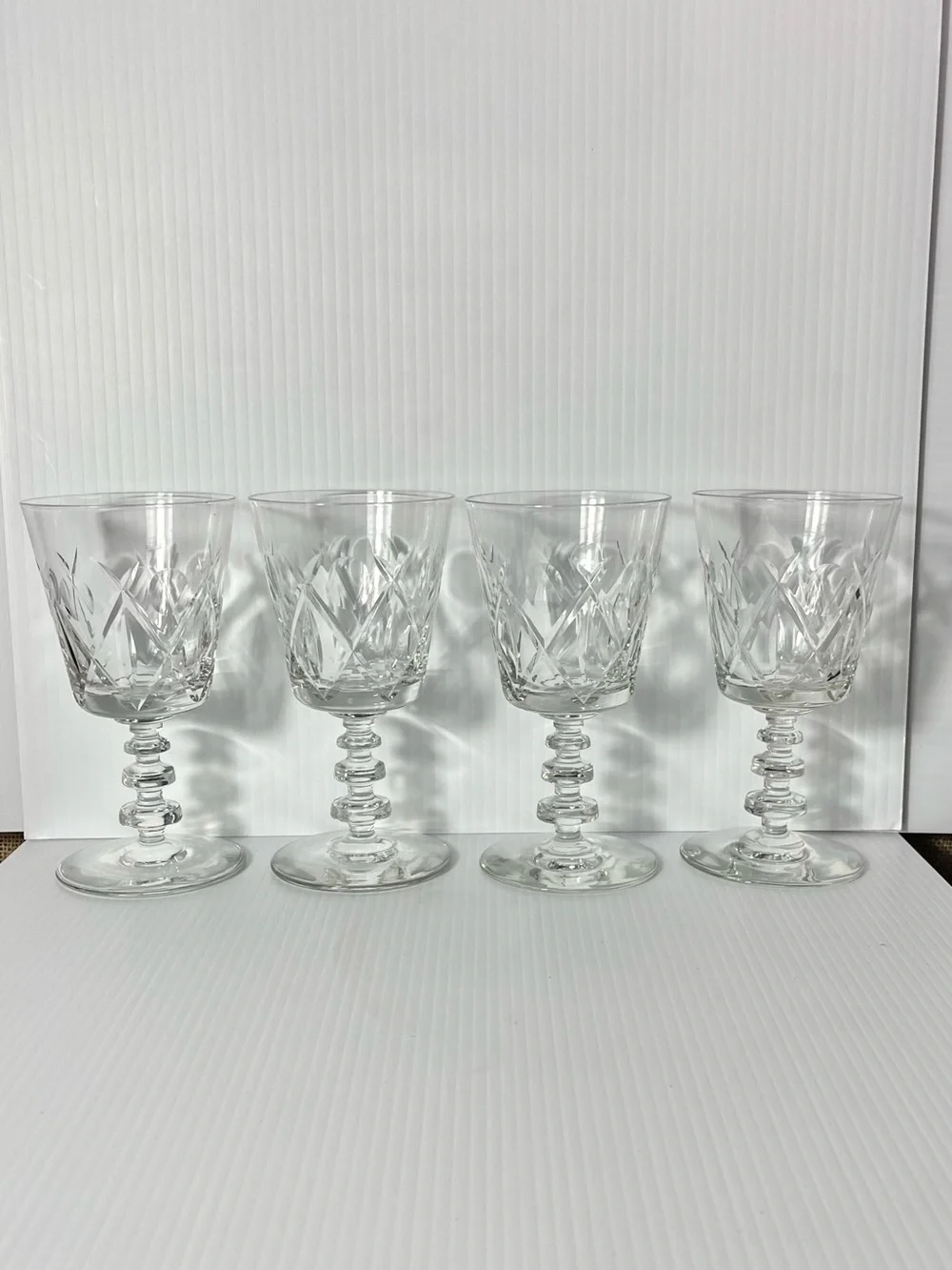 Set of Four Rock Sharpe Olive and Cross Footed Water / Wine Goblets